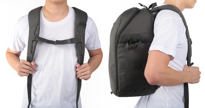 Young man standing with travel backpack equipments isolated white background