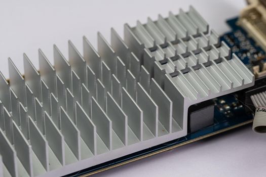 heatsink of an electronic board on a white surface