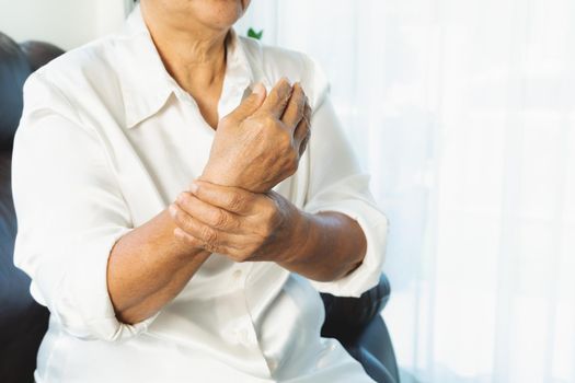 wrist hand pain of old woman, healthcare problem of senior concept