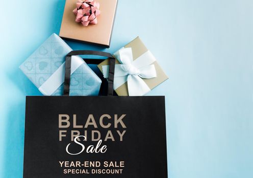 Black Friday sale, black shopping bag with gift box for online shopping