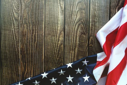 American flag on wooden background with copy space