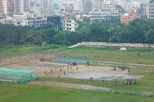 group of boys having fun playing soccer football