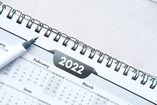 2022 J year calendar on office desk.