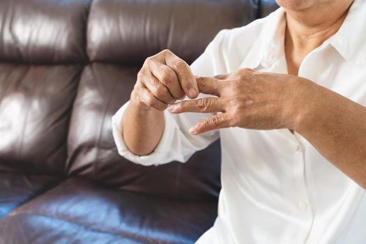 finger pain of old woman, healthcare problem of senior concept