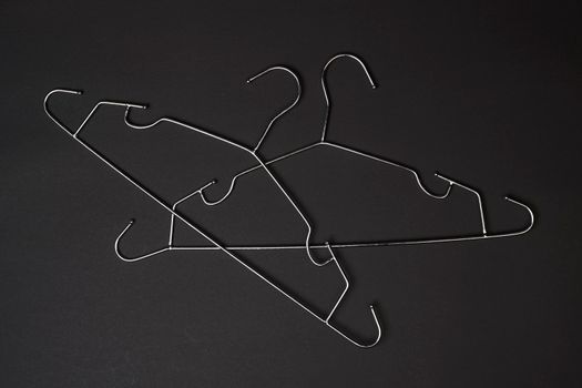 Black friday concept. Steel Cloth Hangers on black background