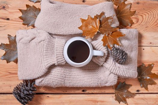 A cozy autumn day. Cold autumn morning with cup of coffee. Fall autumn weekend, leisure, mental day off, relaxing at home