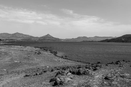 Landscape of the biggest lake in India, with mountains in the background