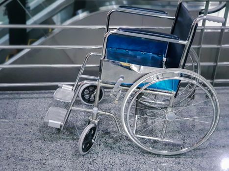 Wheelchair empty wait to use at hospital hallway