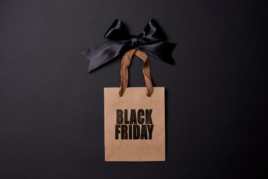 Black friday concept. Shopping bags on black background.
