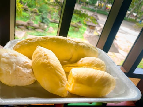 Durian is a king of fruit in Thailand and asia fruit have a spikes shell and sweet can buy at Thai street food and fruit market at agriculture farm