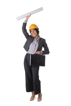 Portrait of female engeneer architect in yellow hardhat and business suit with raised arms isolated on white background full length studio portrait