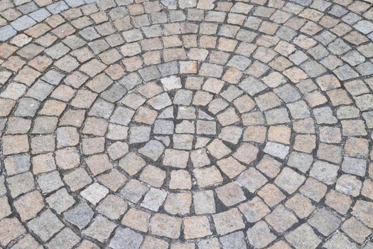 Beautiful view of the stone paving stones in the old part of the city, texture, background