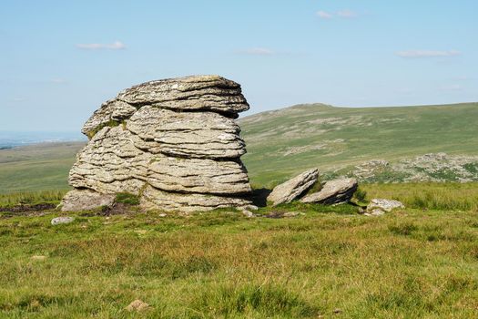 The Tor of Branscombes Loaf on Corn Ridge overlooking Yes Tor, Dartmoor National Park, Devon, UK