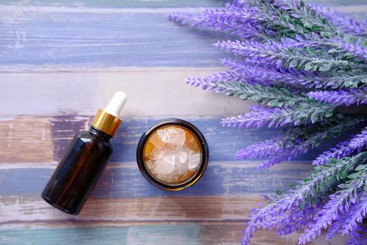 Herbal Lavender Salt And Essential Oil On Table .