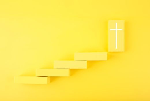 Modern biblical creative religious concept of steps or ladder to faith and God. Yellow steps to cross at the last step.