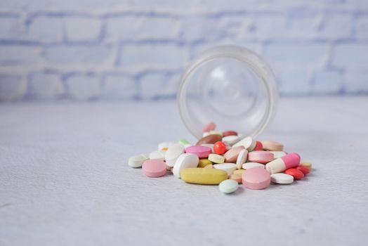 selective focus. Close up of many colorful pills and capsules .