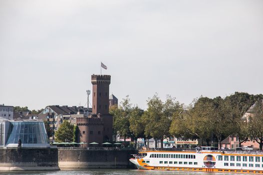 Rhine riverbank with historical tower