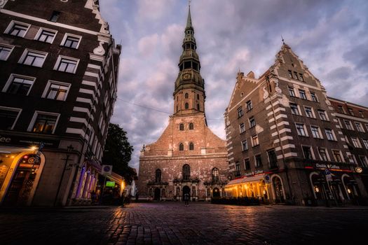 Riga, Latvia. August 2021.  External evening view of the Church of St. Peter in the city center