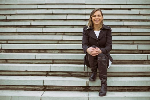 Businesswoman enjoys relaxing outdoor.