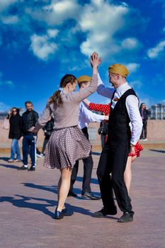 St. Petersburg, Russia - May 09, 2021: Couples dancing on Victory Day on St. Petersburg Square