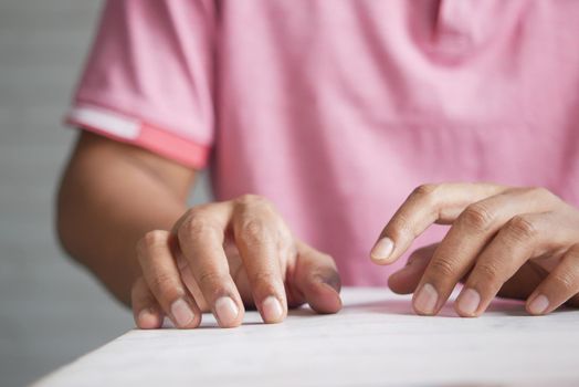 a nervous young man hand .