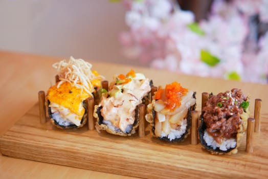sushi and traditional japanese food on table with copy space