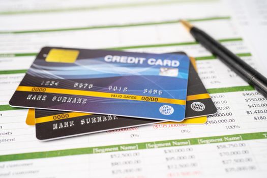 Credit card on spreadsheet paper. Finance development, Banking Account, Statistics, Investment Analytic research data economy, Stock exchange trading, Business company concept.