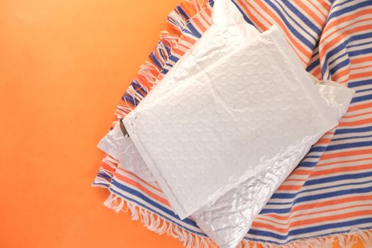 white paper bubble envelope for postal ship.,