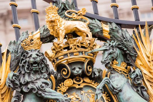 London, UK - January 29, 2017: A detail photo of the Victoria Memorial including a unicorn and lion statue outside of Buckingham Palace in London.