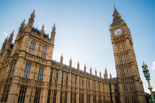 London, UK - February 4, 2017: Wide angle close up of the Big Ben clock tower and Parliament gorgeous architecture with clear blue skies.