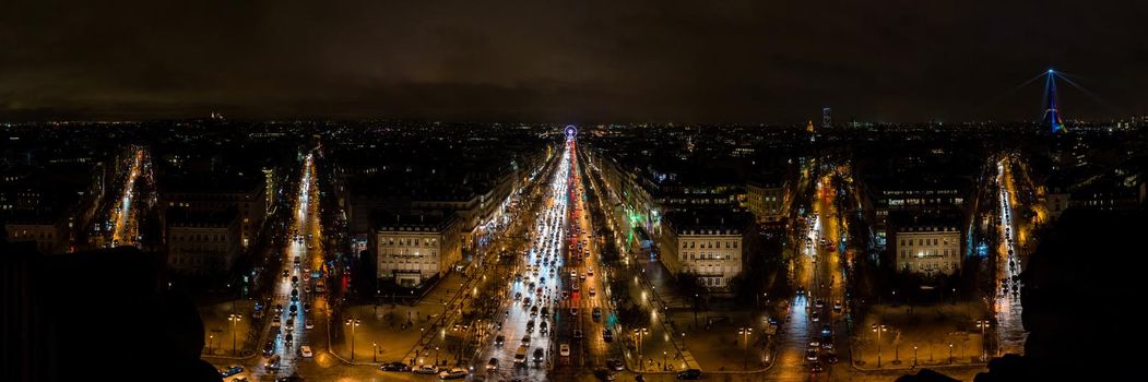 Paris, France - February 3, 2017: Champs-Elysee avenue in Paris. Aerial view panorama wide photo