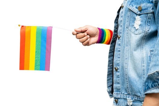 Asian lady holding rainbow color flag isolate on white background, symbol of LGBT pride month celebrate annual in June social of gay, lesbian, bisexual, transgender, human rights.