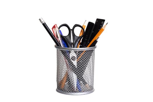 Office supplies in metal stand isolated on a white background