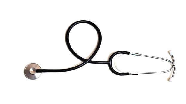 Black stethoscope isolated on a white background close up