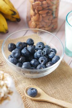 Close up of fresh blue berry with water drops