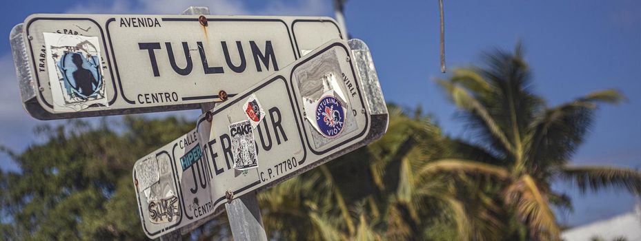Road sign indicating the direction for the city of Tulum. Mexico. Banner image with copy space.
