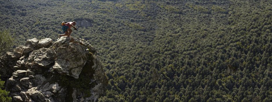 Boy Climb to the top of the mountain, banner image with copy space