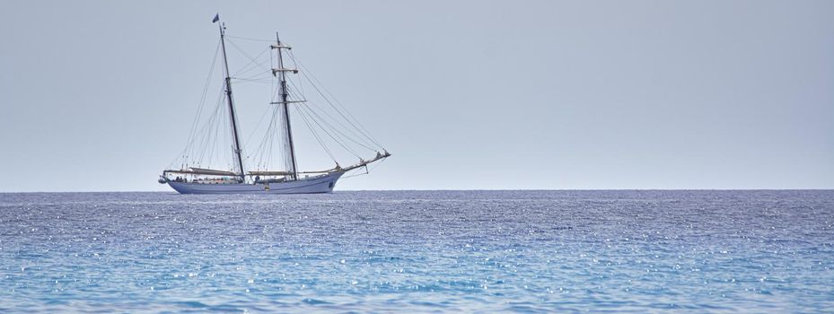 Sailing ship at sea, banner image with copy space