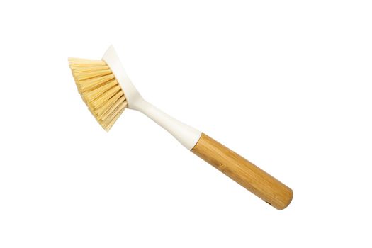 Wooden dish brush with bamboo wood and natural Bristle Tampico Fiber, on white background . Item for cleaning in kitchen. High quality photo