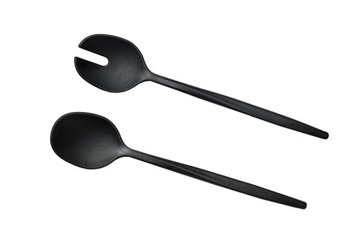 Two black plastic spoons , kitchen accessories on white background isolated top view