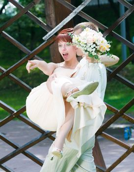 Young wedding couple together after the ceremony