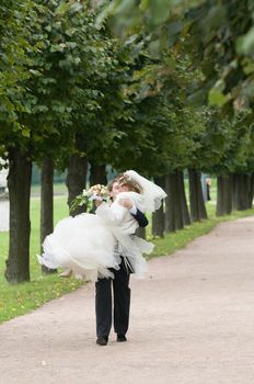 Young wedding couple together after the ceremony