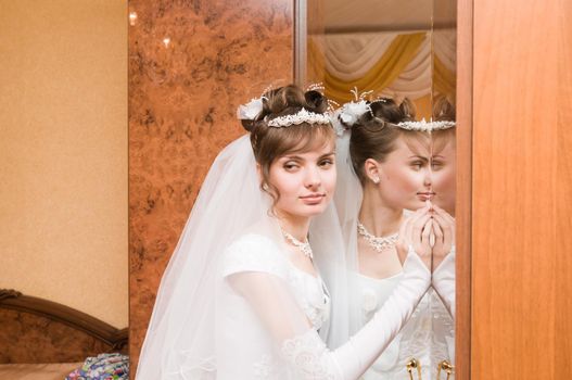 Happy Young bride posing before wedding ceremony