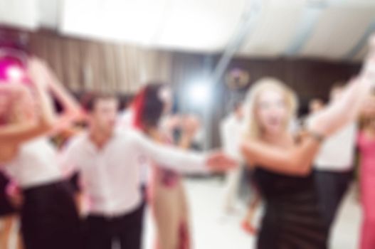 People dancing blur background