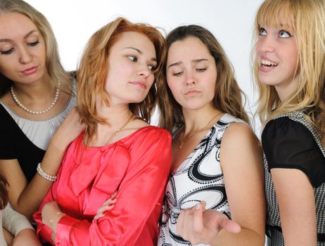 Beautiful young women friends together in studio