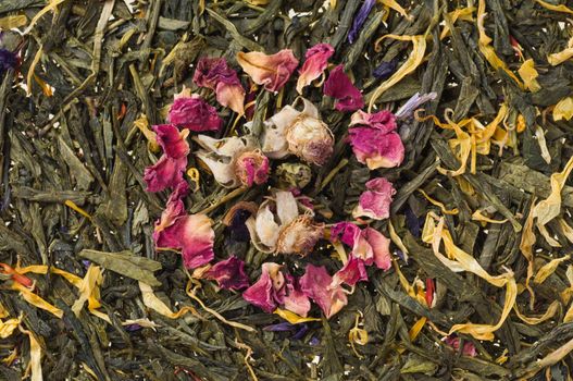 Heap of dry chinese green tea - background texture. Macro shot