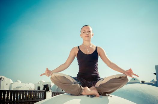 Yoga teacher - young woman outdoors