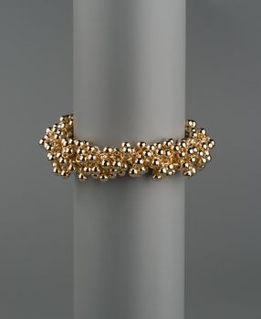 Jewellery bracelet closeup shot on grey background