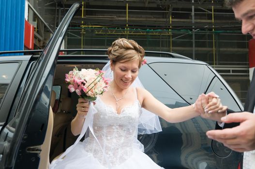 Young wedding couple together after the ceremony