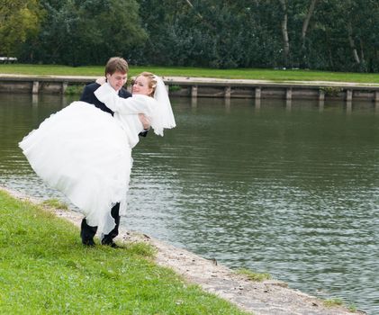 Young wedding couple together after the ceremony